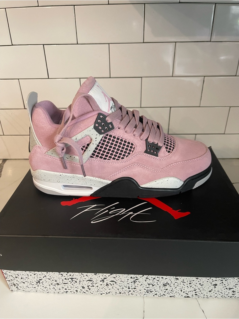 Men’s Retro 4 Pink Orchid Size 9.5.